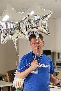 The author, with pretty balloons. (Photo by Kevin Baird.)